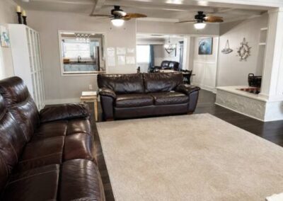 Great room with sectional seating at The Salted Dream House.