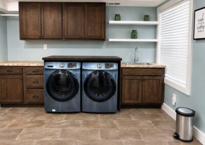 Laundry room with full-size washer and dryer at The Salted Dream House.