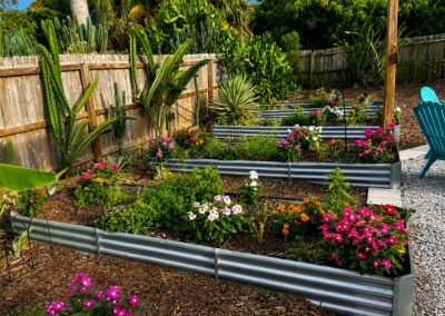 Colorful butterfly garden and tropical landscaping at The Salted Dream House.